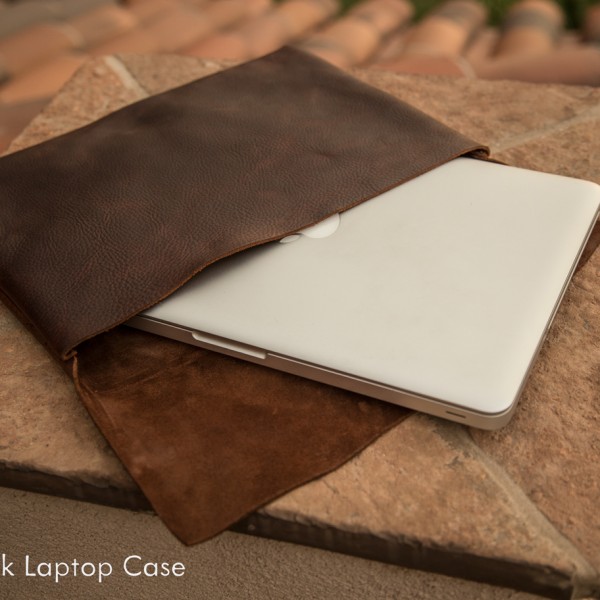 The Kodiak Leather Laptop sleeve is designed to fit a 13" macbook pro made by Trekker Leather Co in Tempe, Arizona, USA.
