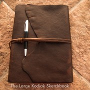 This is a large kodiak leather sketchbook on the roof of my house.
